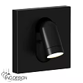 Black Cylindrical Wall Sconce Illuminated On Square Panel With Soft Light