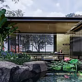 Traditional Chinese Garden Landscape With Pond Rocks Trees And Classic Architecture