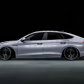 Silver Modern Sporty Sedan Car With Sleek Body Front Grille And Alloy Wheels