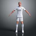 Man in White Real Madrid Football Jersey Shorts and Socks Standing Pose