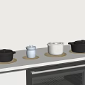 Cooking Pots Container And Cup On White Countertop With Brown Round Mats