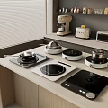 Modern Kitchen Countertop With Induction Cooktops Pots Coffee Maker Toaster And Microwave