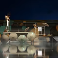 Elegant Japanese Stage Design Featuring Umbrella Decorations Wooden Structure And Night Lighting