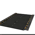 Asphalt Road With White Lane Markings And Yellow Black Speed Bumps