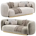 Light Gray Sectional Sofa with Soft Throw Pillows Cozy Blanket and Gold Metal Legs