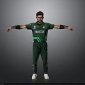 A Man in Green Pakistan Cricket Uniform with Arms Outstretched Standing