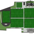 Well Designed Soccer Fields With Multiple Green Turf Buildings Grandstand And Floodlights
