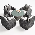 Gray Wicker Outdoor Sofa with White Cushions Surrounded by Round Patio Table 3d model