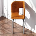 Stylish Oak Wood Single Chair With Black Metal Legs In Sunlit Room