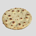 Freshly Baked Homemade Naan Bread With Golden Brown Bubbly Surface And Charred Spots