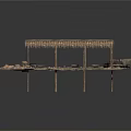 Rustic Thatched Roof Structure With Wooden Posts Platforms And Stone Decorations