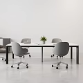 Modern Gray Wheeled Leisure Chairs In Office Interior With Table And Plants