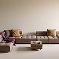 Modern L Shaped Taupe Sofa Set With Throw Pillows Blanket And Coffee Table