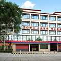 Modern Fire Station Building with Fire Truck Trees and Safety Stripes