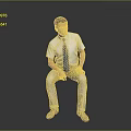Man Sitting On Dark Surface Wearing Light Blue Shirt Striped Tie And Khaki Pants