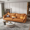 Orange Double Sofa With Decorative Pillows Round Coffee Table And City View Through Window