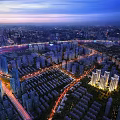 Urban Aerial Planning View With High Rise Buildings And Illuminated Road Networks