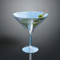 Elegant Martini Glassware With Frosted Rim And Green Olive Garnish On Dark Background
