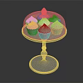 Colorful Pink And Green Cupcakes On Transparent Stand With Glass Dome