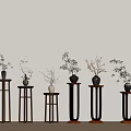 Stylish Wooden and Metal Plant Stands with Potted Plants Against Light Wall and Wooden Floor