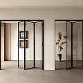 Modern Glass Folding Doors with Black Frames Open and Closed in Interior Space with Plant