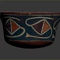 Vintage Red and Blue Decorative Bowl With Geometric Patterns And Cracked Surface