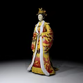 Woman In Traditional Imperial Costume With Elaborate Golden Headdress And Embroidered Robe