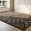 Decorative Square Area Rug With Intricate Black Blue Orange Patterns On Wooden Floor