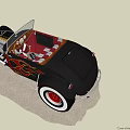 Vintage Black Convertible Car with Flame Design Large Red Rims and White Tires