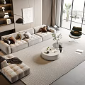 Modern Living Room With Beige Sofa And Round Coffee Table Set Rug And Floor Lamp