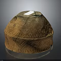 Traditional Terracotta Vessel With Cracked Surface And Intricate Geometric Patterns