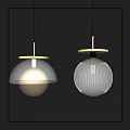 Modern Glass And Brass Spherical Ribbed Pendant Lights Against Dark Wall