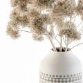 Elegant White Vase with Geometric Pattern Holding Beige Pompom Dried Flowers