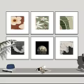 Six Framed Decorative Paintings On Wall With White Shelf Vase Books And Figurine 3d model