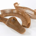 Modern Outdoor Landscape Seats With Curved Wooden Striped Structure And Sleek Design