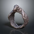 Artistic Detailed Metallic Eagle Head Decorative Ring With Textured Surface Design