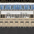Traditional Japanese Restaurant With Blue Curtains Wooden Ceiling Stone Walls Bar Counter And High Stools