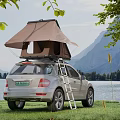 Stunning Mountain Lake Scenery With Silver SUV Roof Tent On Grassland