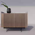 Modern Wooden Sideboard with Vertical Slats Black Legs and Green Leaf Vase on Top