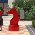 Garden Landscape in Front of White Building with Green Trees Shrubs Red Sculpture and People