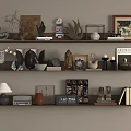 Decorative Ornament Arrangement on Wooden Shelves with Sculptures Photo Frames Vases and Books