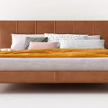 Modern Double Bed With Brown Leather Headboard Multiple Pillows And Orange Blanket 3d model
