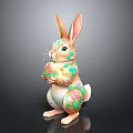 Decorative Rabbit Figurine With Colorful Floral Patterns Holding Egg for Festive Home Decoration