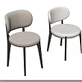 Modern Minimalist Dining Chairs With Light Beige Upholstery And Black Wooden Legs