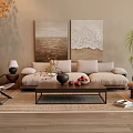 Beige Sofa and Coffee Table Set With Abstract Paintings Floor Lamp Green Plant and Rug