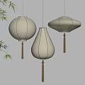Chinese Hanging Lanterns Yellow Round Teardrop and Octagonal Shapes with Wooden Tassels and Bamboo Branches