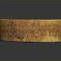Intricately Carved Circular Decorative Box With Floral Patterns And Ornate Designs