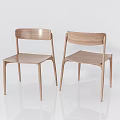 Modern Wooden Dining Chairs With Simple Design And Sleek Legs In Minimalist Setting