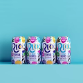 RIO Tropical Flavored Canned Beverage With Colorful Fruit Design On Blue Background