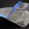 Camouflage Pattern Folder Packaged In Transparent Plastic Bag With Blue Handle 3d model